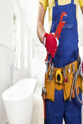 Technician standing in home kitchen